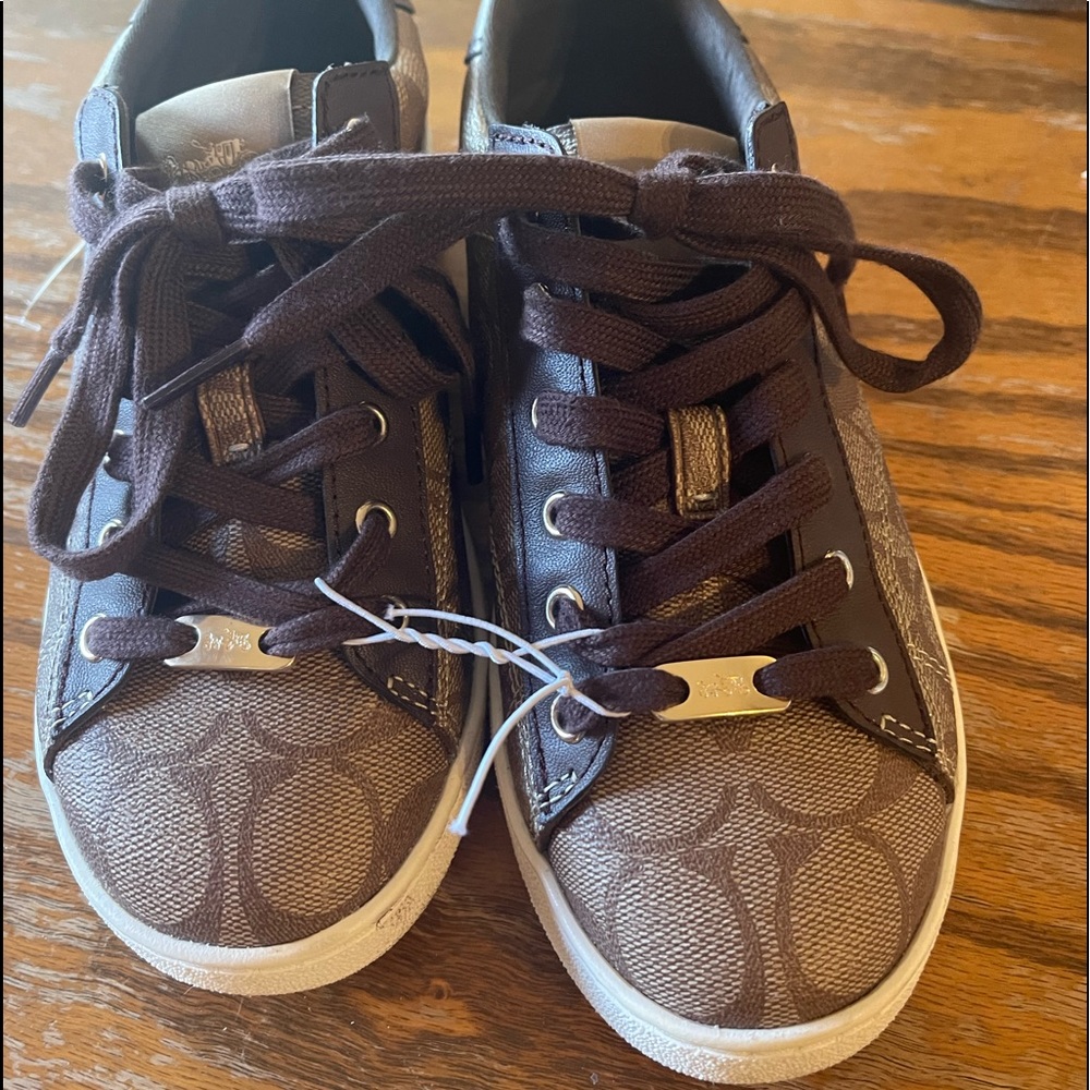Brand new never worn COACH tennis shoe